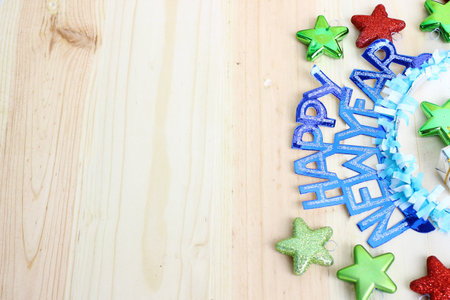 new year decoration on wooden background with space for text