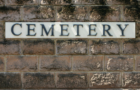 Sign at gate of a cemeteryの写真素材