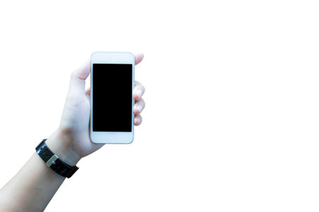 Hand hold up smartphone isolated on white background with copy spaceの写真素材