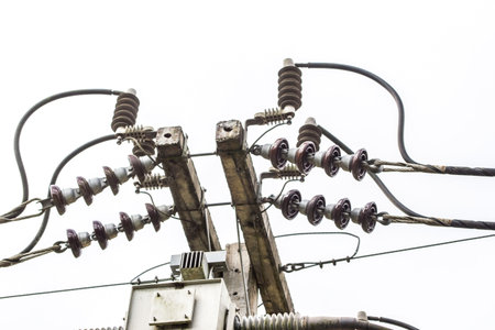 Electric poles on white background.の写真素材