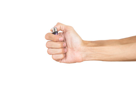 Hand holding lighter isolated on white background with clipping path.の写真素材