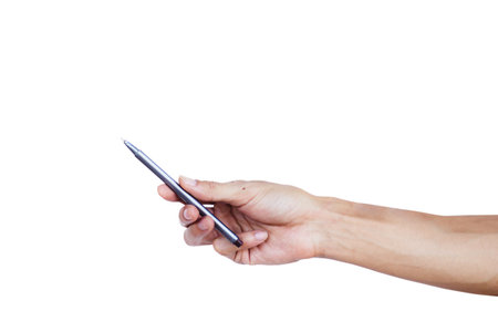 Hand holding pen point something text isolated on white background.  The pen is a device used to write letters to memorize the memories on paper. Many colors such as blue, red, black.の写真素材