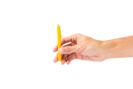 Hand holding candle isolated on white background with clipping path.の写真素材