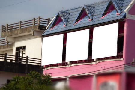 White blank billboard or signboard on street side for mock up presentation.の写真素材