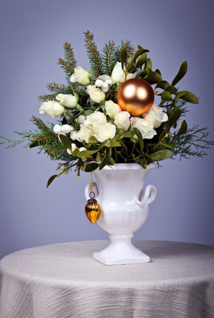 Still life with white roses and christmas decorationsの写真素材