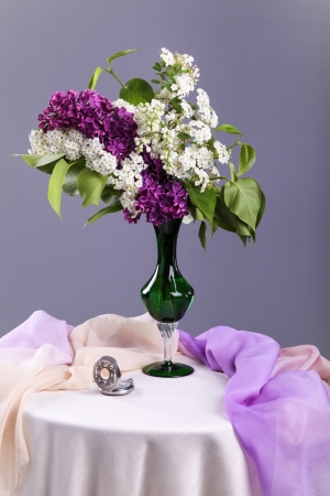 Still life with white and purple lilac in vase の写真素材