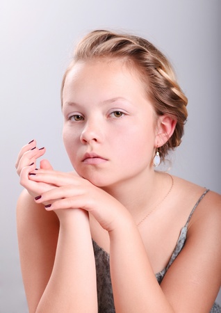 Portrait of beautiful pretty young girl with blonde hair の写真素材
