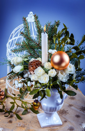 Still life with white roses and christmas decorationsの写真素材