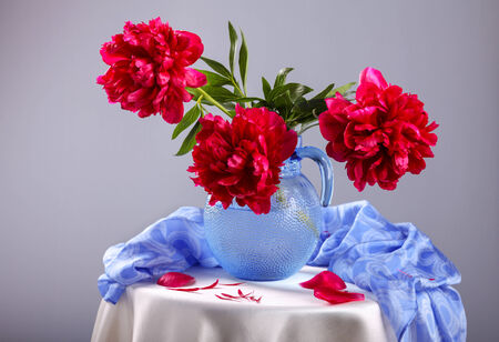 Still life with beautiful purple peonies in  vaseの写真素材