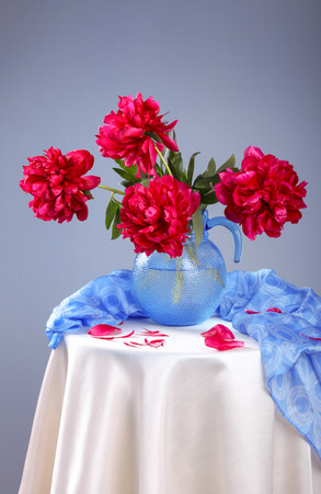 Still life with beautiful purple peonies in  vaseの写真素材