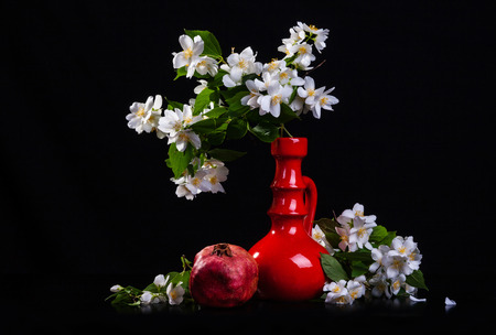 Jasmine bouquet in the vase on black backgroundの写真素材