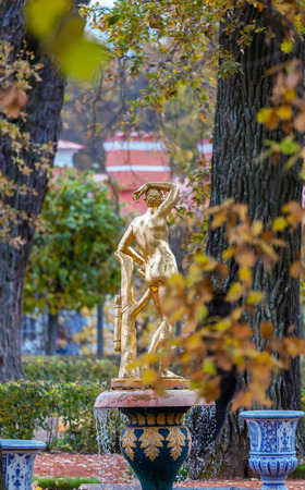 PETERHOF, RUSSIA - OCTOBER 16: Monplaisir Garden  with a gold  Sculpture in Peterhof, Russia, October 16, 2016 in Peterhof, Russia. Former residence of the Russian monarchs.のeditorial素材