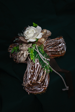 Funeral flower arrangement with Crossの写真素材