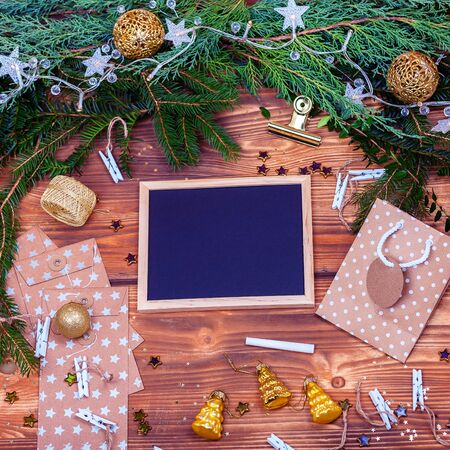 Christmas background with Chalkboard and  winter foliageの写真素材