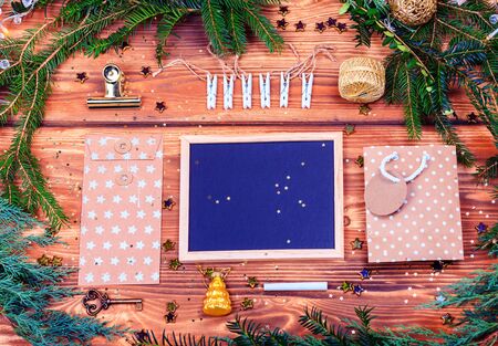 Christmas background with Chalkboard and  winter foliageの写真素材