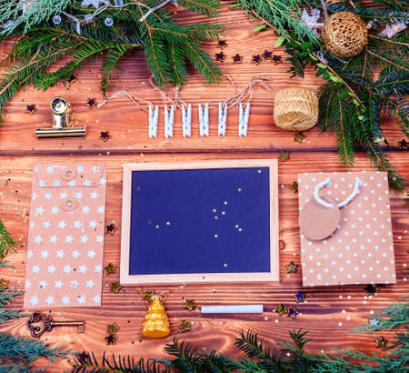 Christmas background with Chalkboard and  winter foliage