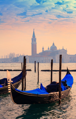 Venice gondolas moored by Saint Mark square during winter daysの写真素材