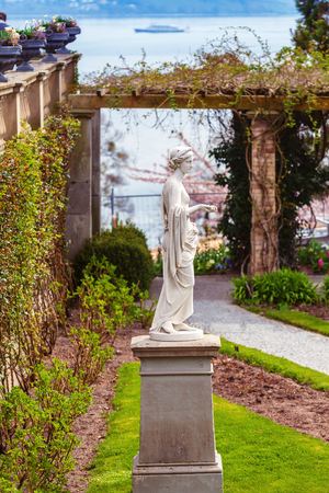 MAINAU, GERMANY - APRIL 15, 2018: Stone sculpture in the rose garden on the flower Island Mainau, Lake Constance, Germany, Europeのeditorial素材