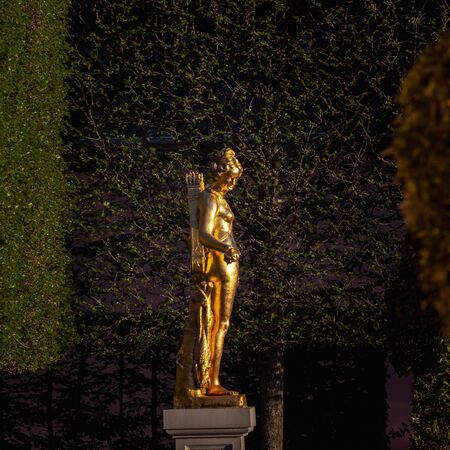 Schwetzingen, Germany - APRIL 19, 2019: Statue of a godness in Schwetzingen park, Germanyのeditorial素材