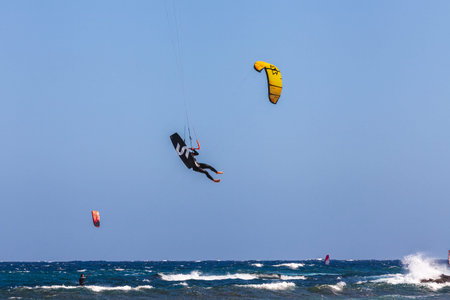 El MÃ©dano, Tenerife, Canary Islands, Spain â€“ 01.03.2026: Kitesurfer riding waves in the...