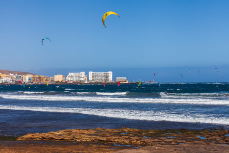 El Medano, Tenerife, Canary Islands, Spain â€“ March 1st, 2026: Kitesurfers and windsurfers...