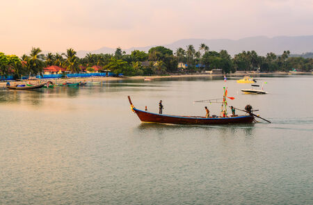 Long tailed boat is coming back from fishing in south of Thailand.のeditorial素材