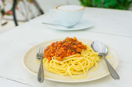 Spaghetti bolognese on white table.の写真素材