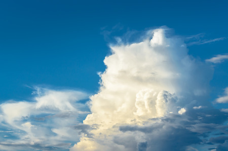 Blue sky with big cumulus clouds.の写真素材