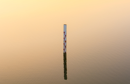water level gauge in sunset light.