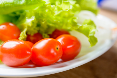 close up of fresh tomato in vegetable salad.の写真素材