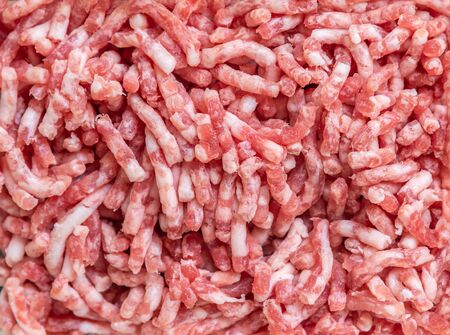 Raw food minced pork meat top view close up image.