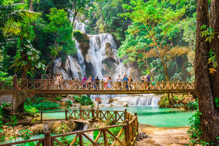 LUANG PRABANG, LAOS - NOVEMBER 16, 2014: Kuang Si waterfall is a favourite side trip for tourists in Luang Prabang.のeditorial素材