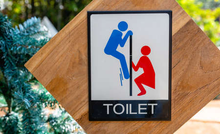 Toilet sign post of outdoor toilet.
