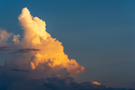 Dramatic sunset sky with beautiful color sun light and cloudy sky.の写真素材