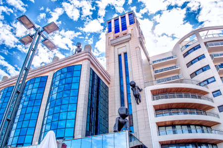 A beautiful building with statues of faceless babies as a symbol of anti-abortion protest. September 1, 2014, Blankenberge, Belgiumの写真素材