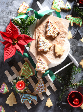 Original shortbread cookies with icing in the form of Christmas trees still lifeの写真素材
