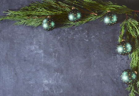 Christmas or new year table decor with fir branches, holly branches with berries