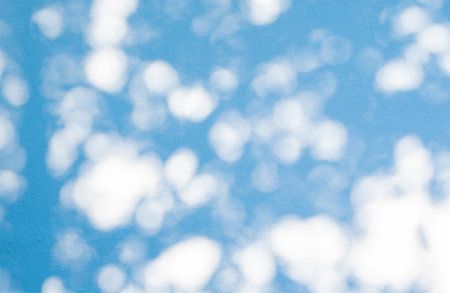 luxury white and blue bokeh texture on white wall background light and shadows