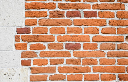 Traditional Flemish orange brick wall with alternating stretcher and header courses in each course,...