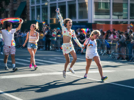 Girls cheering in the parade of Stonewall 50 â WorldPride NYC 2019のeditorial素材