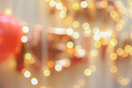 Blurred images of balloons with warm lighting in the conference room for the backgroundの写真素材