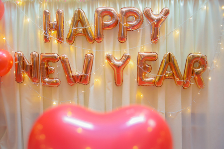 Blurred images of balloons with warm lighting in the conference room for the backgroundの写真素材