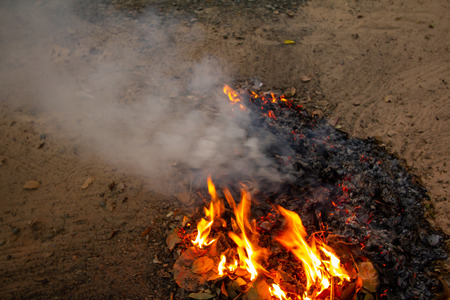 Bonfire of the fallen leaves during autumnの写真素材