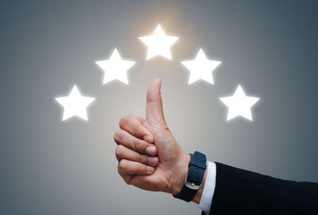 Hand of client show thumb up with five star rating.