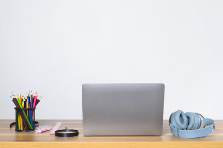 notebook on student desk online at homeの写真素材