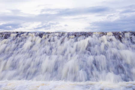 The water overflows the reservoir in the rainy season.の写真素材