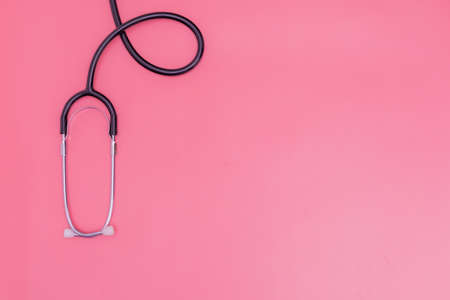 stethoscope on pink background and copy spaceの写真素材