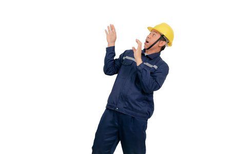 A man wearing a mechanic's work uniform