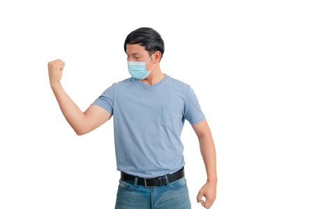 Asian man wearing face mask to protect from coronavirus or COVID-19 isolated on white background.の写真素材