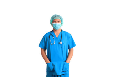 Portrait of a female doctor wearing blue scrubs and mask isolated on white backgroundの写真素材